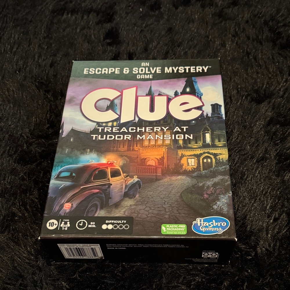 Hasbro Clue Treachery at Tudor Mansion Board Game - Black, Purple, Blue